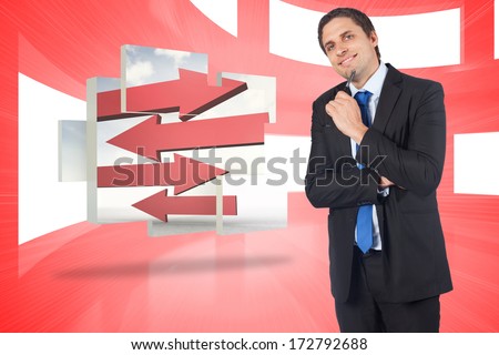 Thinking businessman holding pen against bright red room with windows