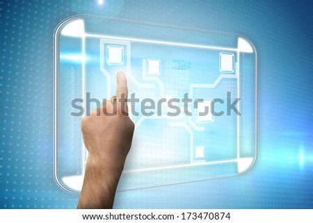 Hand pointing against technical screen with pixels