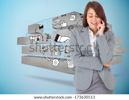 Happy thinking businesswoman against faint brain on blue background