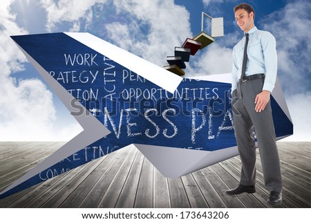Happy businessman standing with hands in pockets against book steps leading to door on sky