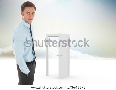 Serious businessman with hand in pocket against opening door in sky