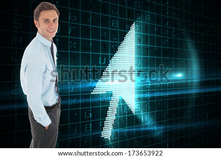 Happy businessman standing with hand in pocket against blue red and green arrow circle