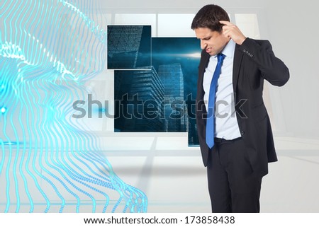 Thinking businessman scratching head against abstract blue design in white room