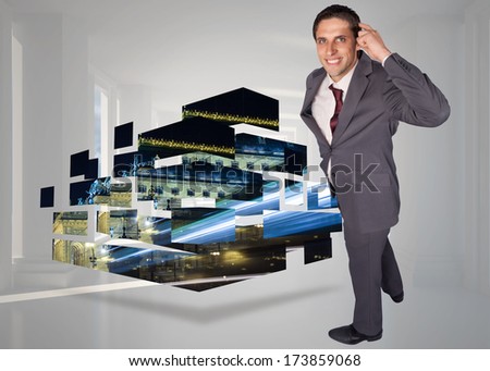 Thinking businessman scratching head against bright white hall with columns