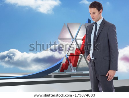 Serious businessman with hand on hip against blue curved arrow pointing up against sky