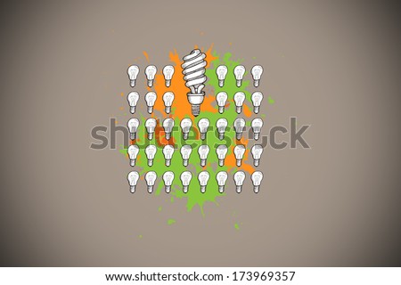 Lgiht bulbs on paint splashes against grey background with vignette