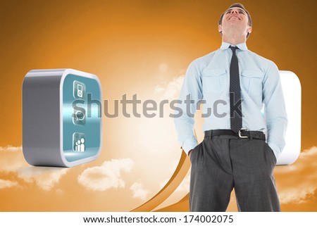 Happy businessman standing with hands in pockets against arrows in the sky in orange