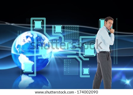 Thoughtful businessman with hand on chin against digital earth background