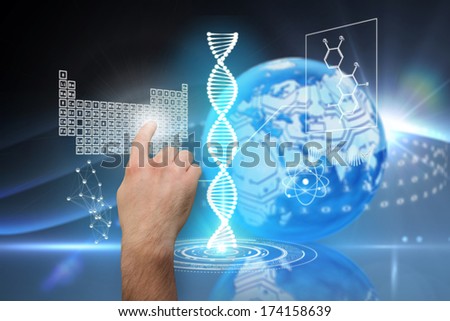 Hand pointing against digital earth background