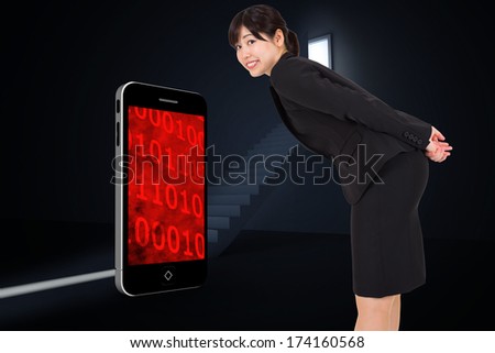 Smiling businesswoman bending against door opening revealing light at top of steps