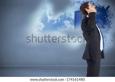 Thinking businessman scratching head against splash showing server tower
