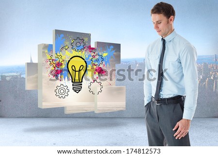 Serious businessman standing with hand in pocket against city scene in a room