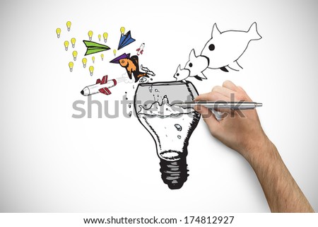 Hand holding a silver pen against white background with vignette