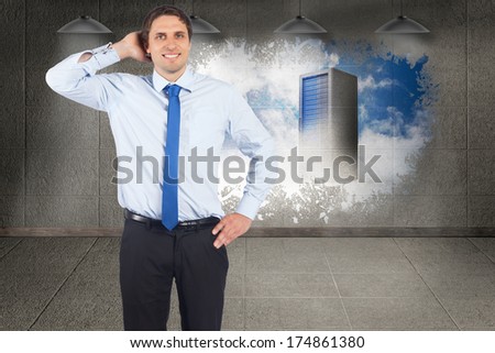 Thinking businessman scratching head against splash on wall revealing server tower