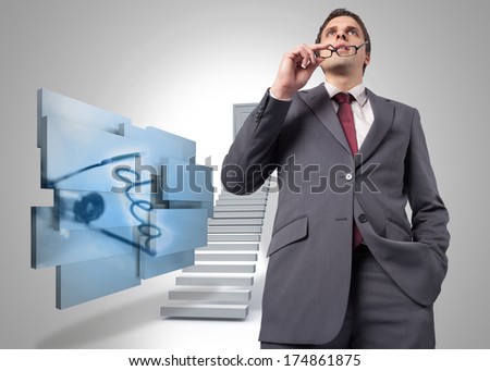 Thinking businessman holding his glasses against shut door at top of steps