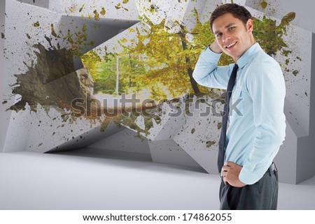 Thinking businessman with hand on head against splash showing forest