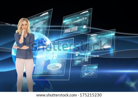 Pensive gorgeous blonde wearing classy clothes posing against digital earth background