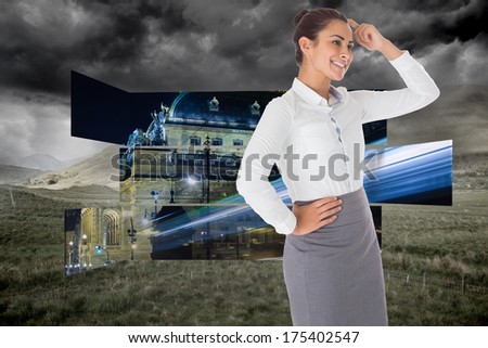 Smiling thoughtful businesswoman against stormy countryside background