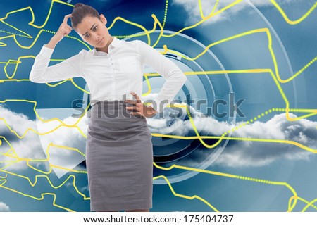 Worried businesswoman against abstract yellow line design on blue sky