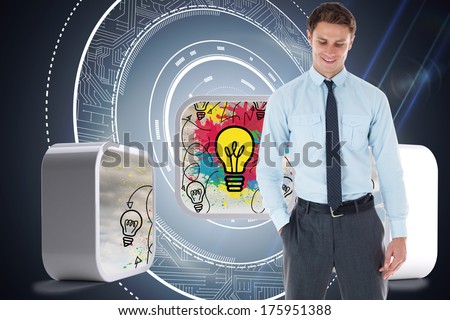 Smiling businessman standing with hand in pocket against black background with glowing circle