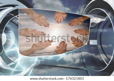 Hands together on abstract screen against cloud and energy design on a futuristic structure