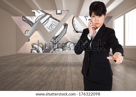 Thoughtful businesswoman pointing against profit graphic on abstract screen in room
