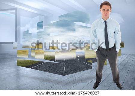Serious businessman standing with hands in pockets against room with holographic cloud