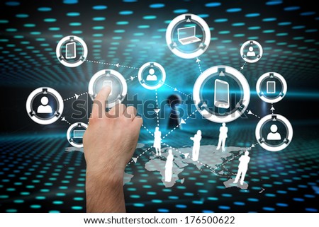 Hand pointing against keyhole on technological glowing background