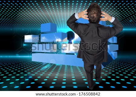 Stressed businessman with hands on head against keyhole on technological glowing background