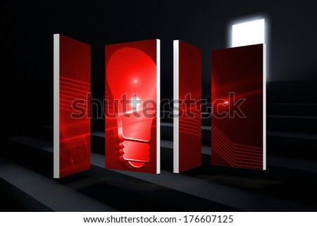 Red light bulb graphic on abstract screen against steps leading to light in the darkness