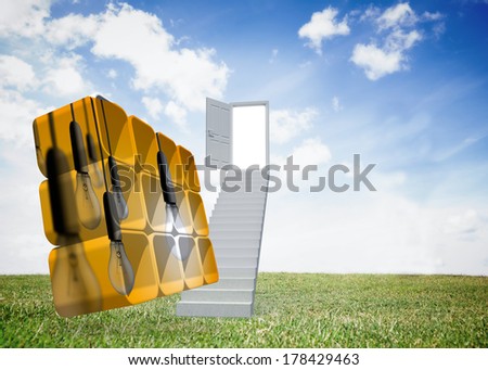 Light bulbs on abstract screen against open door at top of stairs in a field
