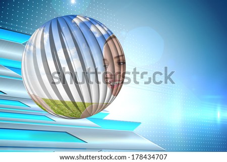 Smiling woman in field on abstract screen against arrows on technical background