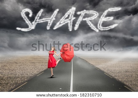 The word share and beautiful woman posing with a broken umbrella against misty brown landscape with street