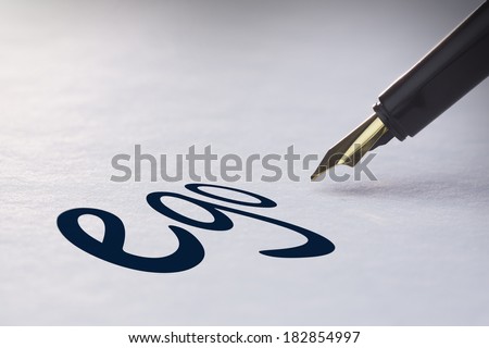 Fountain pen writing the word ego