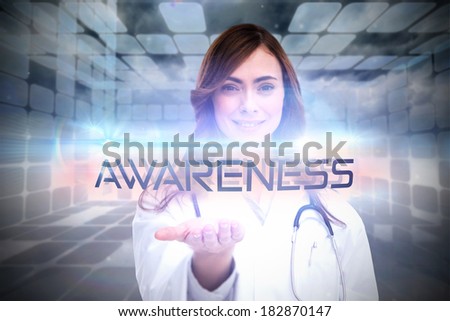 The word awareness and portrait of female nurse holding out open palm against futuristic grey room of squares