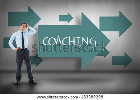 The word coaching and thoughtful businessman with hand on head against blue arrows pointing