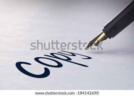 Fountain pen writing the word copy
