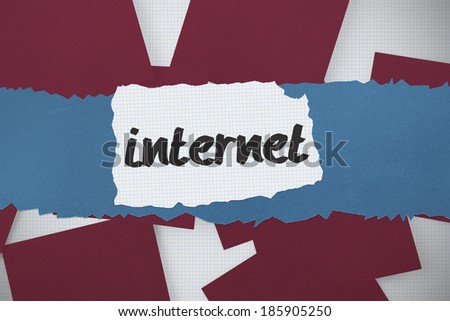 The word internet against wine paper strewn over grid