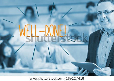 The word well-done! against lecturer standing in front of his class in lecture hall