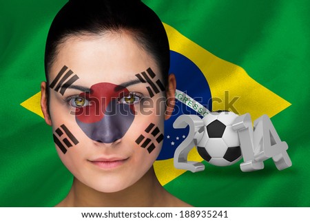 Composite image of korea football fan in face paint with brasil flag