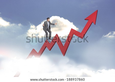Businessman standing with arms out against red jagged arrow pointing up against sky