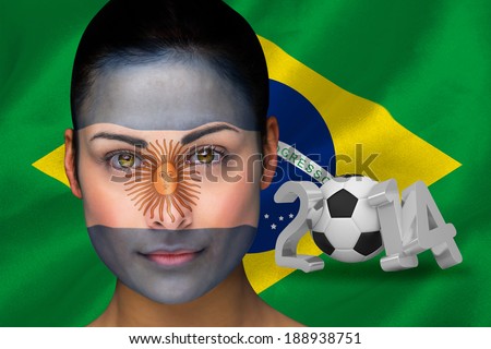 Composite image of argentina football fan in face with brasil flag