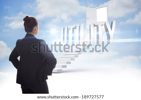 The word utility and businesswoman with hands on hips against steps leading to open door in the sky