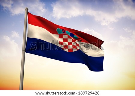 Croatia national flag against beautiful orange and blue sky