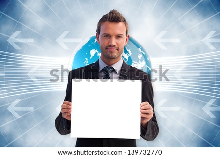 Businessman showing card against global business graphic in blue