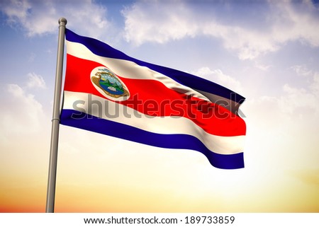 Costa rica national flag against beautiful orange and blue sky