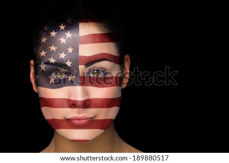 Composite image of usa football fan in face paint against black