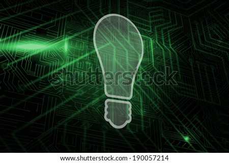 Light bulb against green and black circuit board