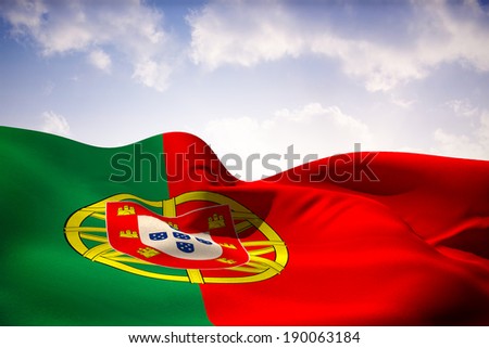 Portugal flag waving against beautiful orange and blue sky