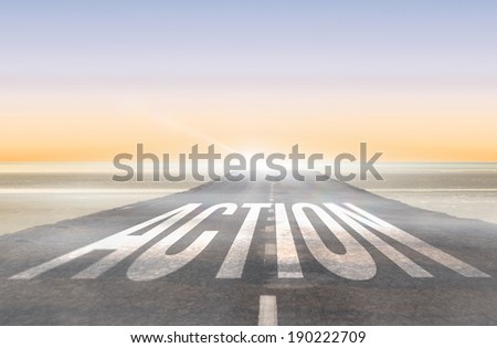 The word action against road leading out to the horizon